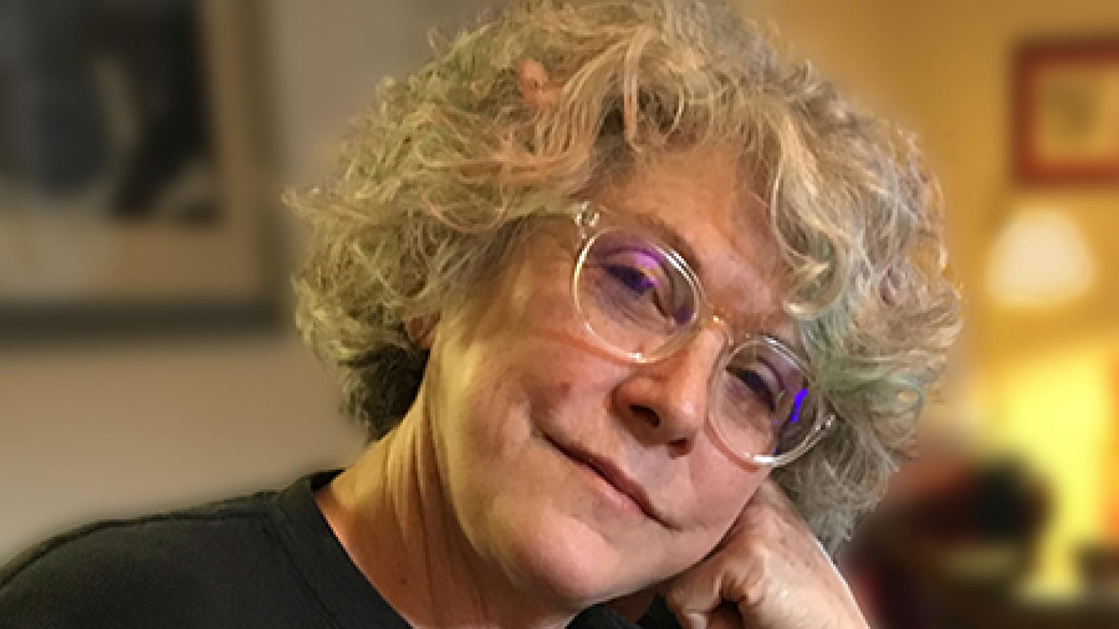 Portrait of a woman wearing glasses. 