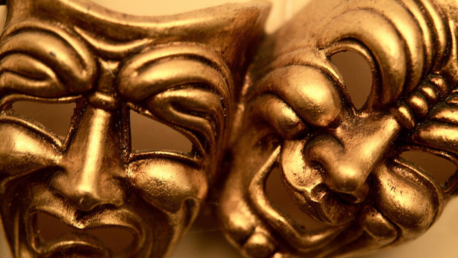 Gold comedy and tragedy masks