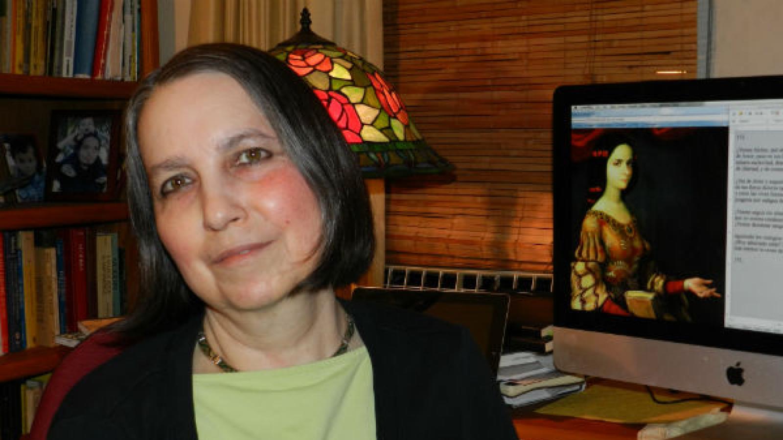 photo of woman in front of computer screen