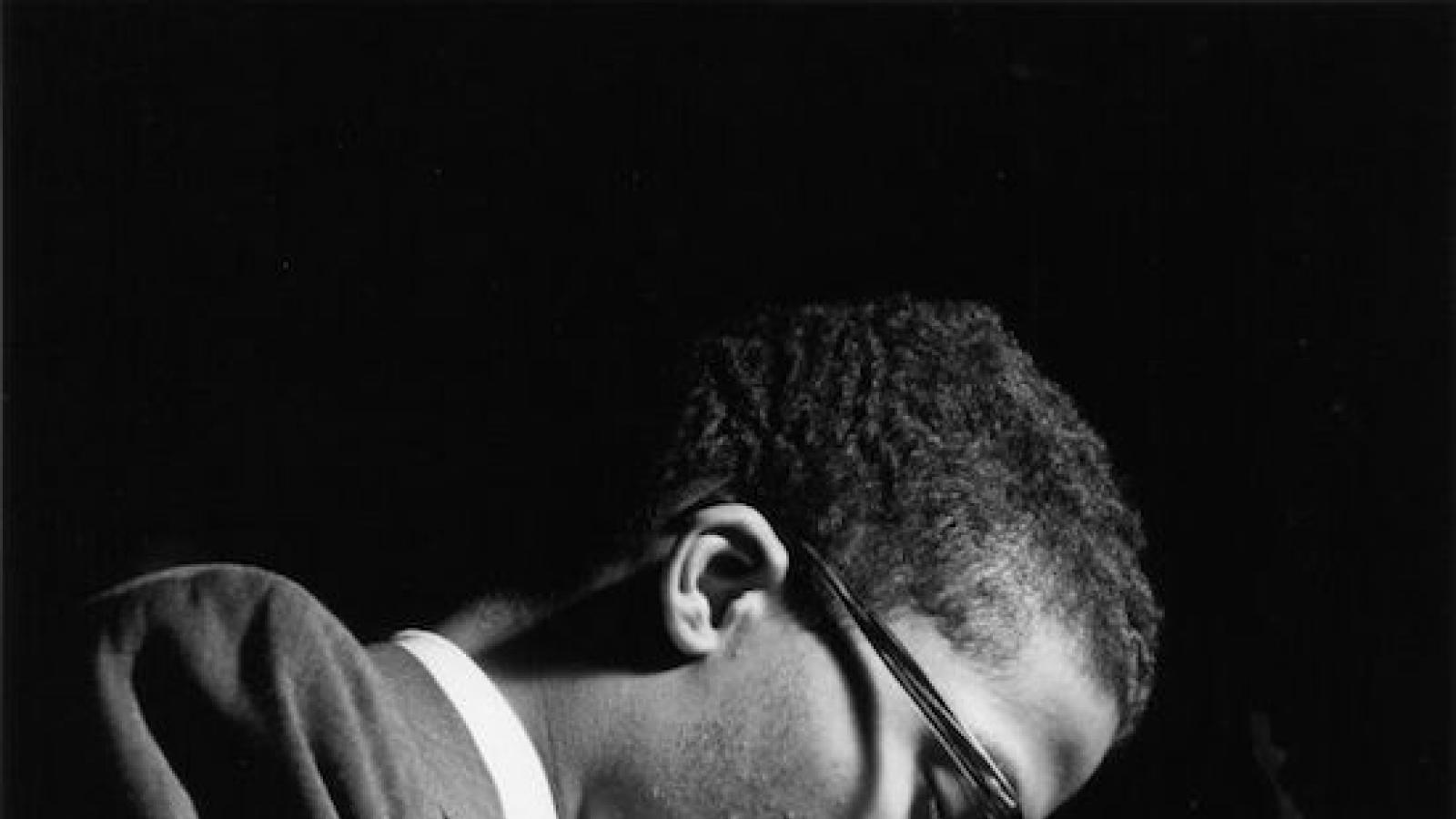 Close-up of jazz musician Herbie Hancock playing a piano