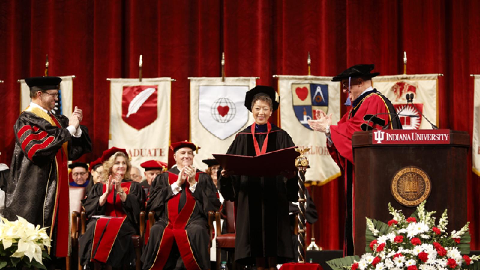 Jane Chu accepting award at commencement