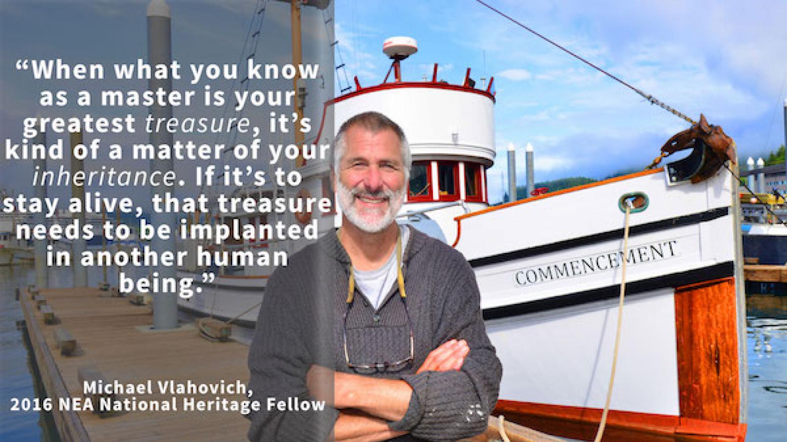 a bearded older white man on a dock in front of a boat
