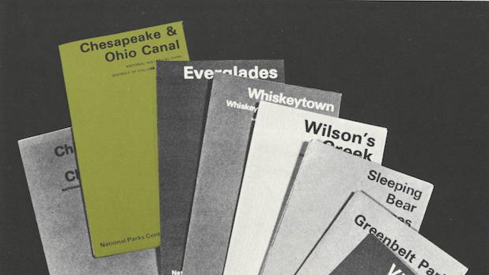 a group of small books with the names of several national parks