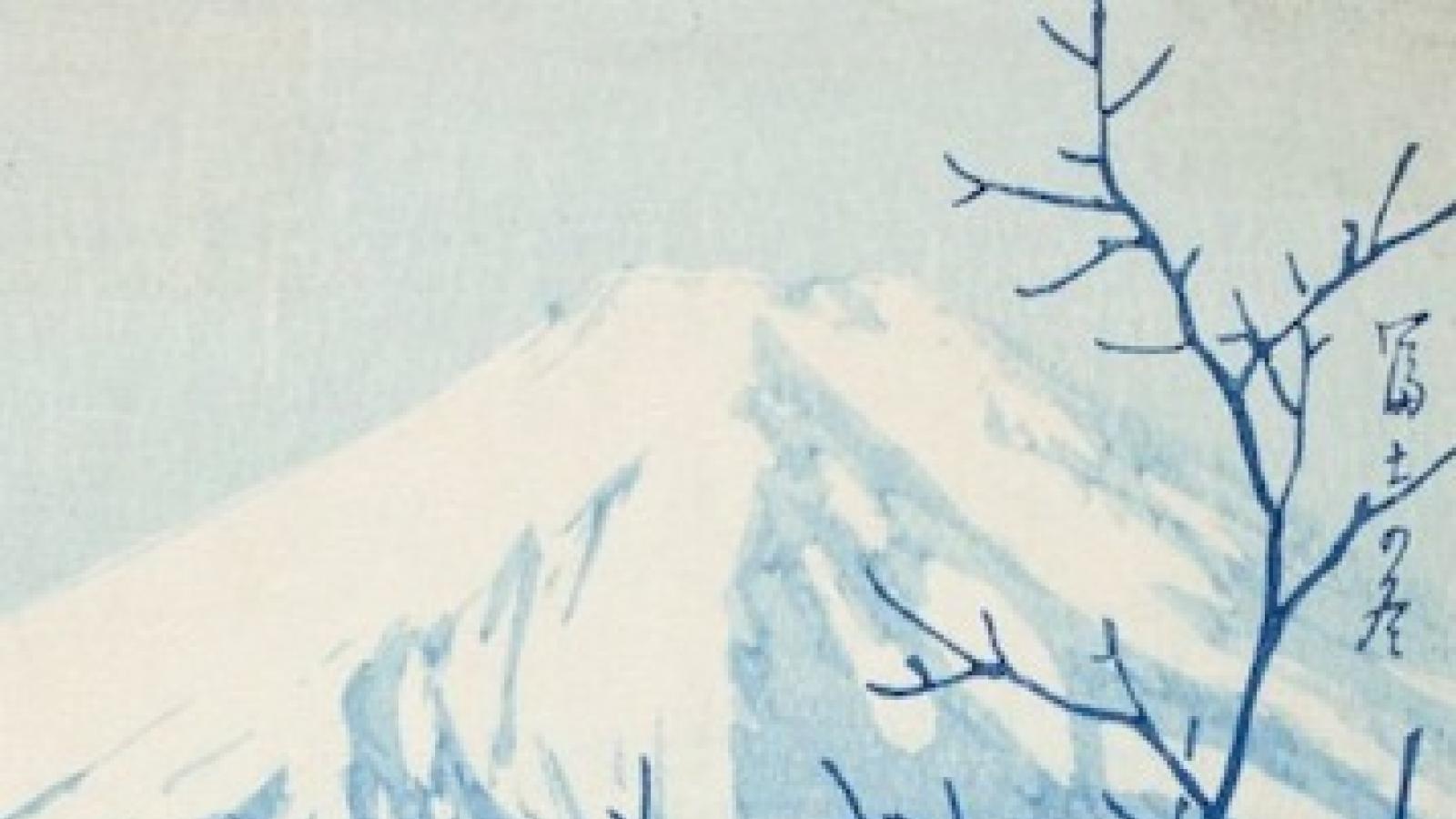 blue and white scene of snow-capped mountain in the background with wooden house in foreground