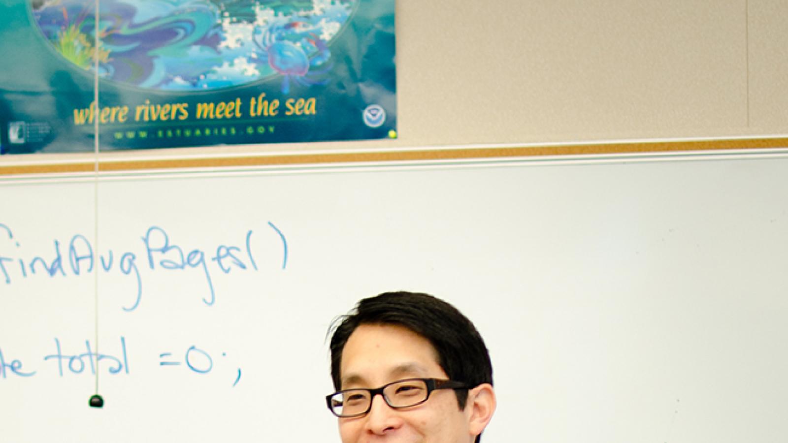 Gene Luen Yang in classroom teaching. 