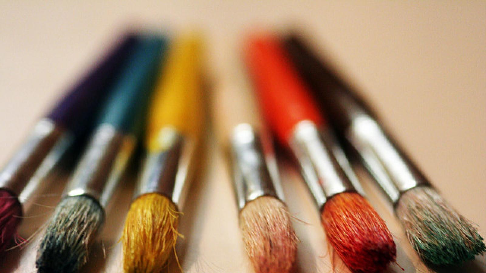 Row of paintbrushes Row of paintbrushes with different colored handles