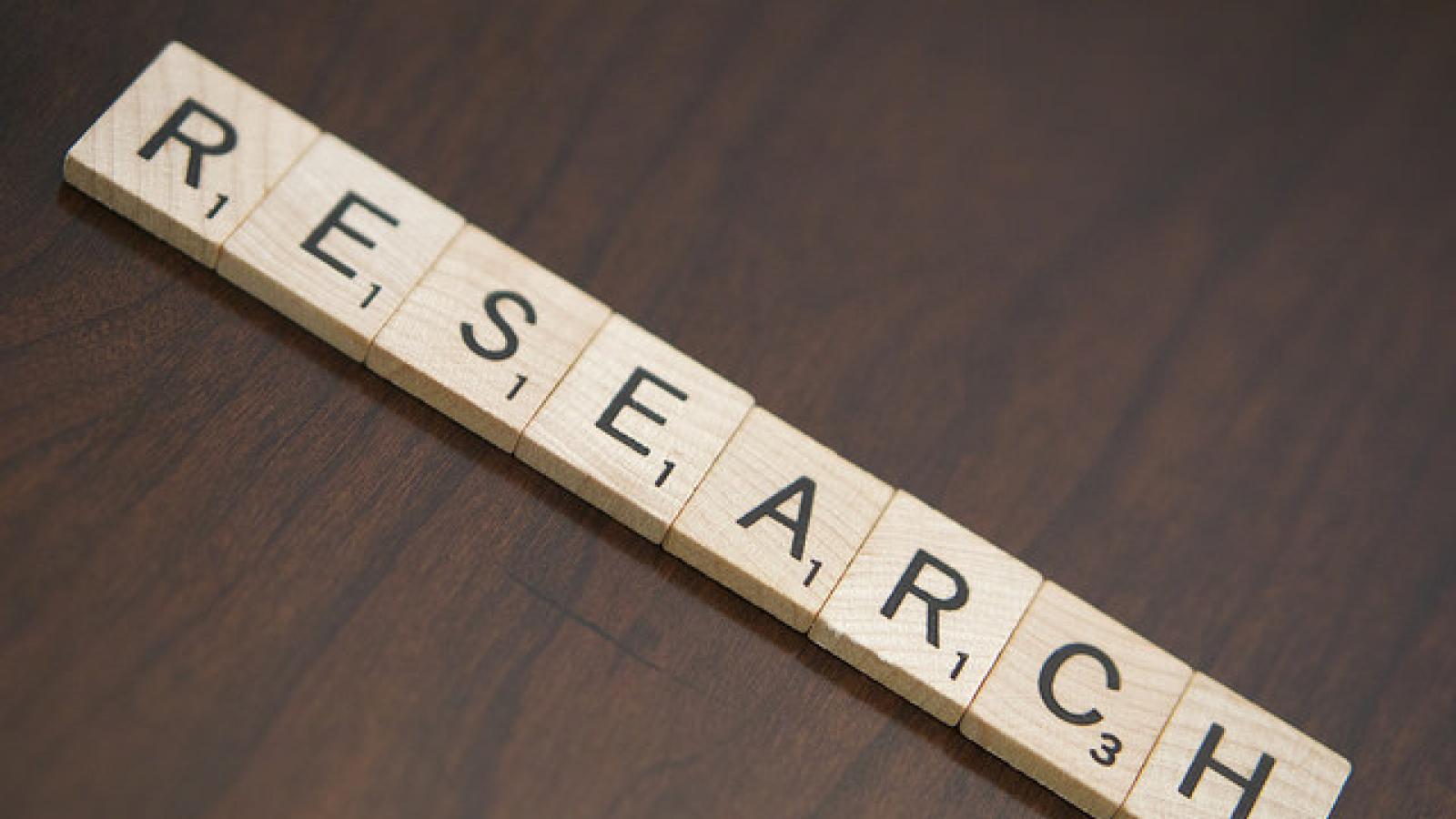 Scrabble tiles that spell research Scrabble tiles spelling out the word "research"