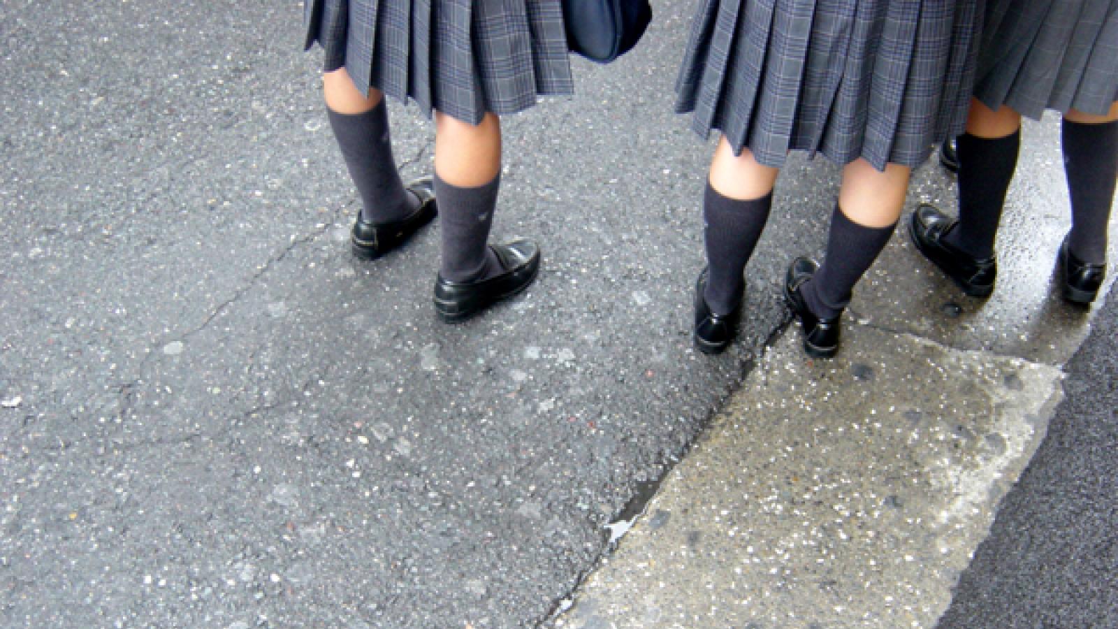 School girls Legs and skirts of uniformed school girls