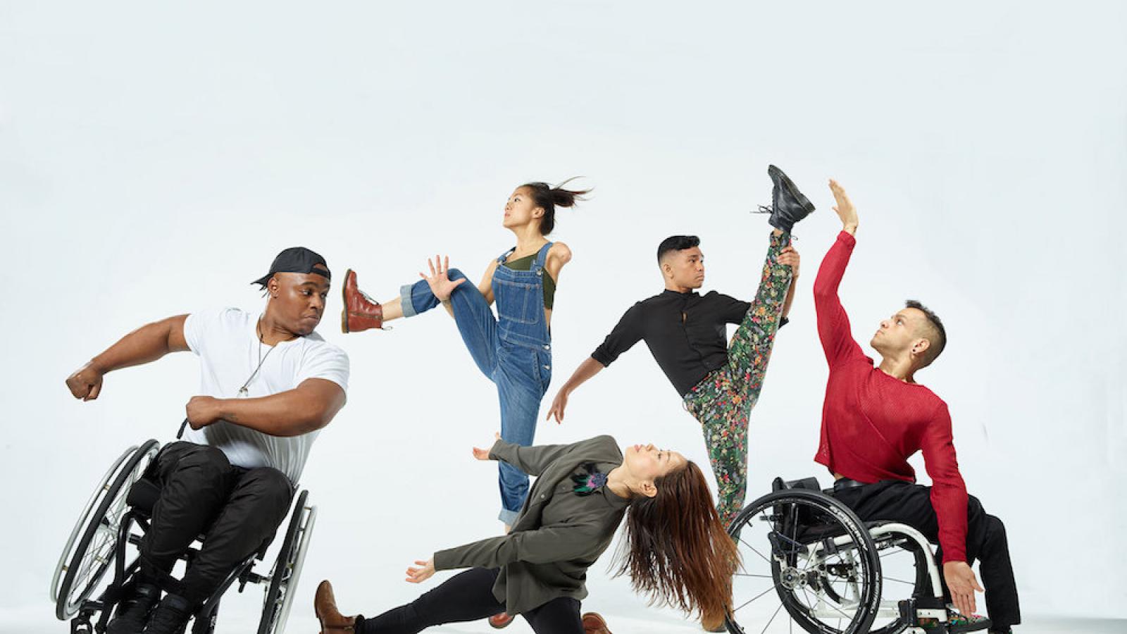 photo of 5 dancers with AXIS Dance Company including two who are using wheelchairs