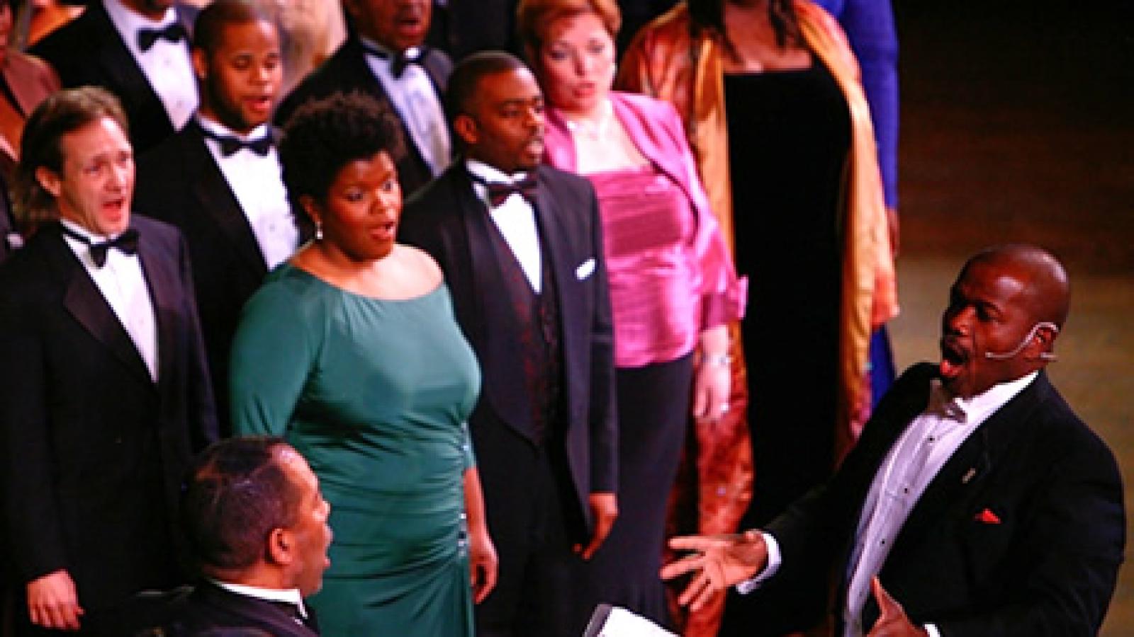 Everett McCorvey (right) directs the American Spiritual Ensemble in a performance at the John F. Kennedy Center for the Performing Arts in 2009. Photo by Jonathan Palmer
