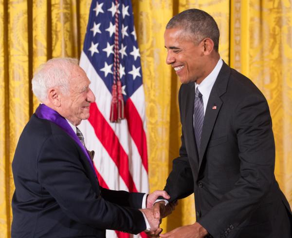 Two men shaking hands.