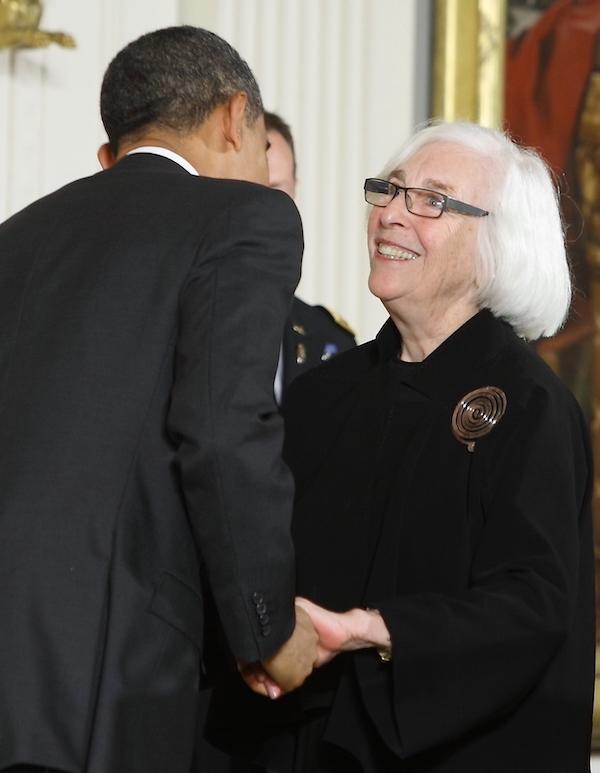 A man and a woman embrace.