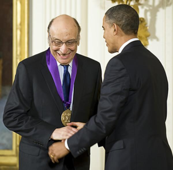 2009 National Medal of Arts recipient and graphic designer Milton Glaser receives his medal from President Barack Obama