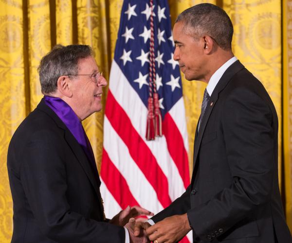 Two men shaking hands.