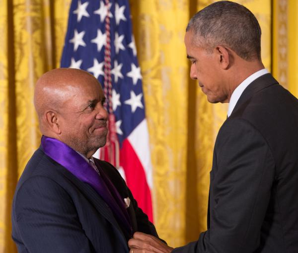 Two men shaking hands.