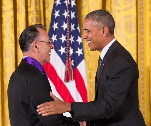 Two men shaking hands.