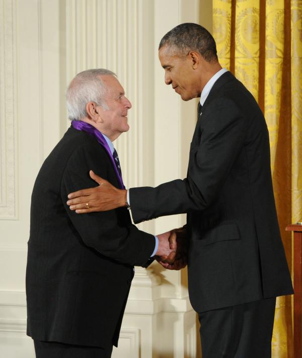 John Kander receiving an award from Barack Obama