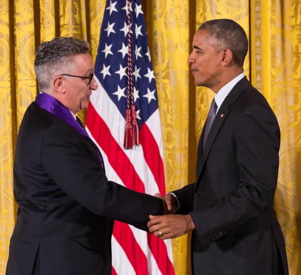 Two men shaking hands.