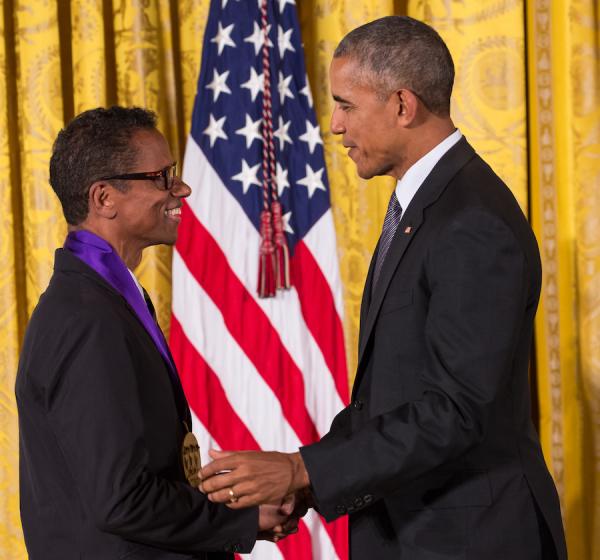 Two men shaking hands.