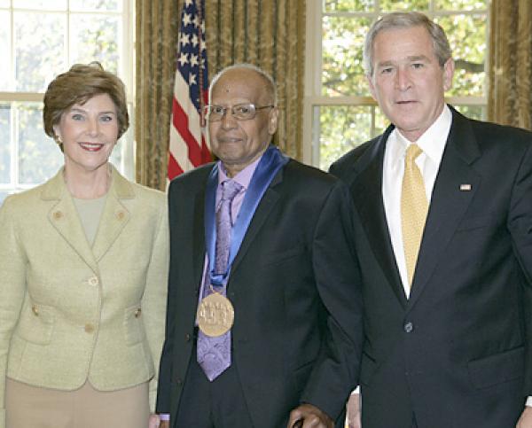The President and First Lady with Roy R. DeCarava in the Oval Office