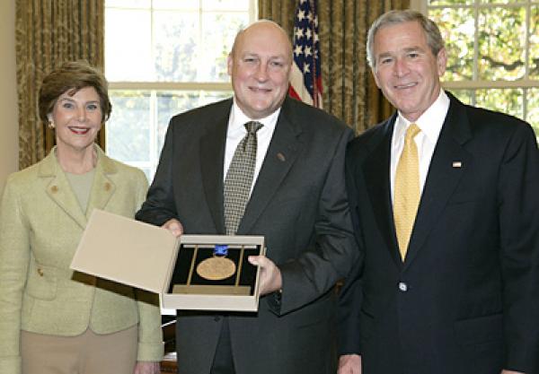 The President and First Lady with Jeffrey Kimpton in the Oval Office