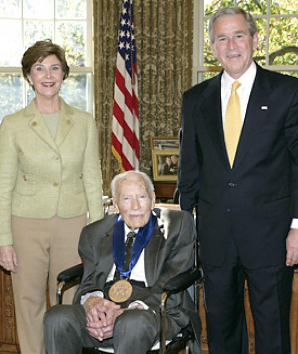 President Bush and Laura Bush with Viktor Schreckengost in the Oval Office