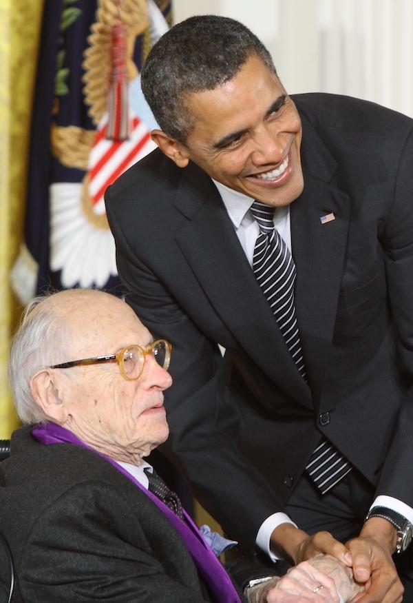 2011 National Medal of Arts recipient and painter/printmaker Will Barnet receives his medal from President Barack Obama at an East Room ceremony at the White House on February 13, 2012.