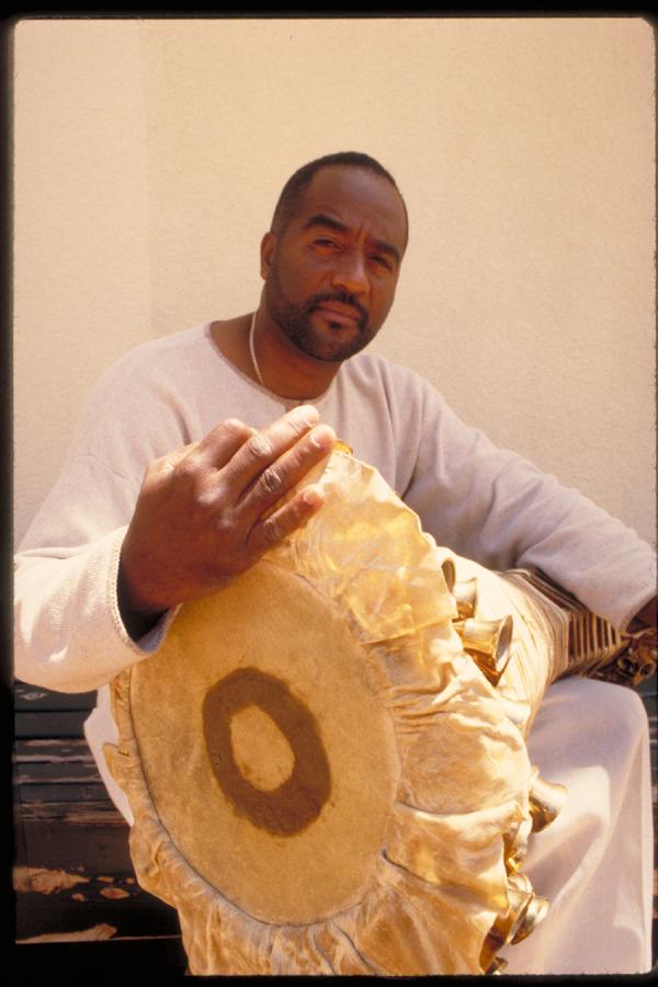 Man holding drum.