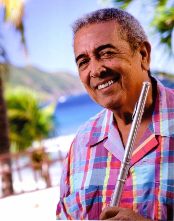 A man holding a flute.