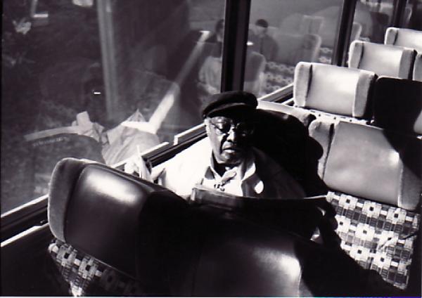 Man sitting on bus.