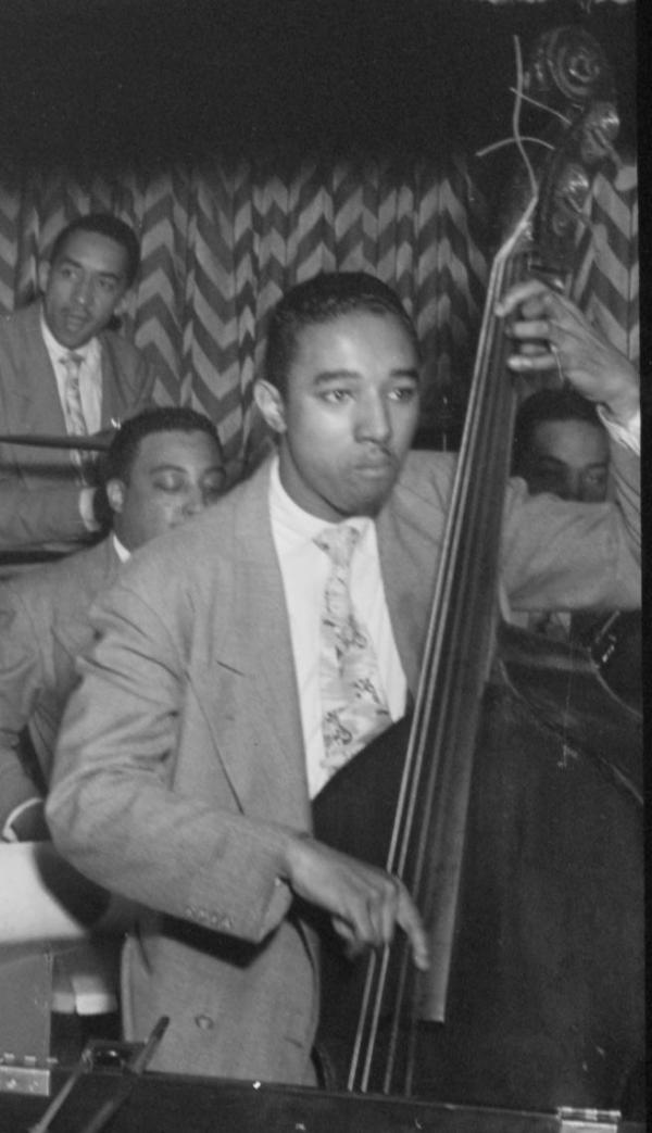 Man playing bass in a jazz orchestra.