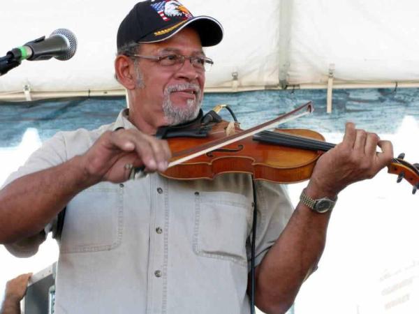 Edward Poullard playing the fiddle