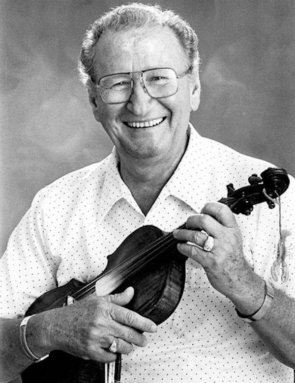 Man holding a fiddle.