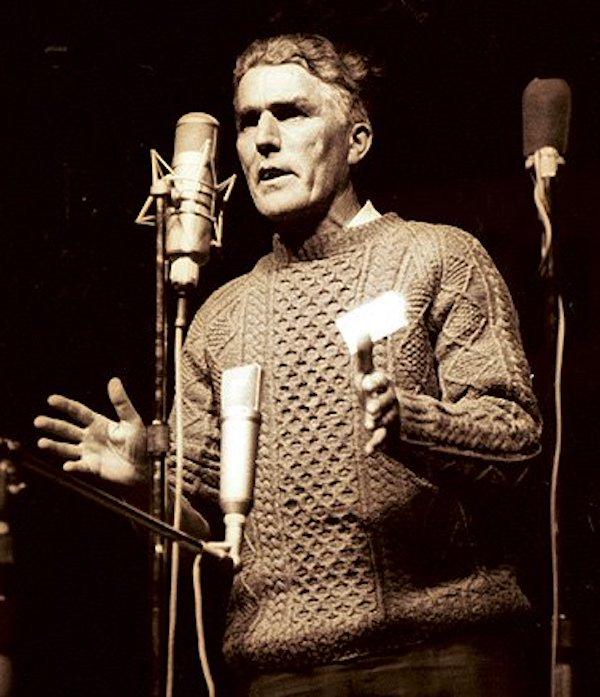 A man speaking into a microphone.
