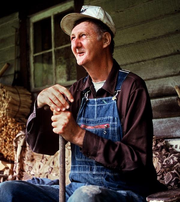 A man sitting on a porch.