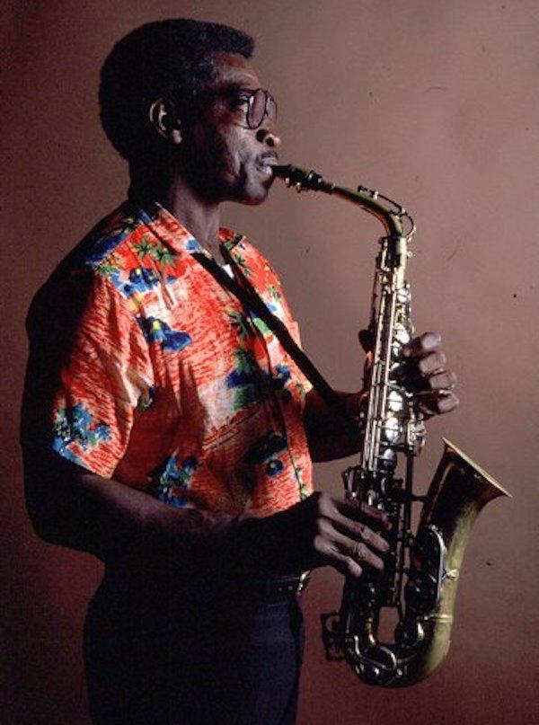 A man playing a saxophone.