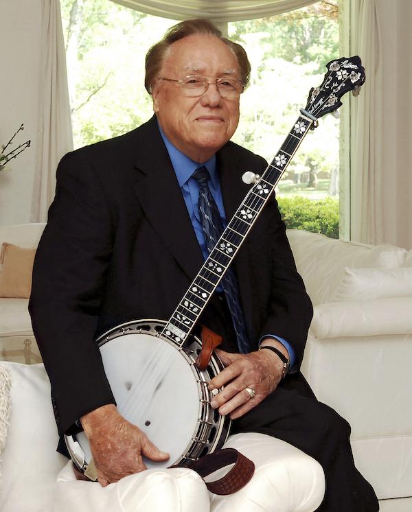 A man holding a banjo.