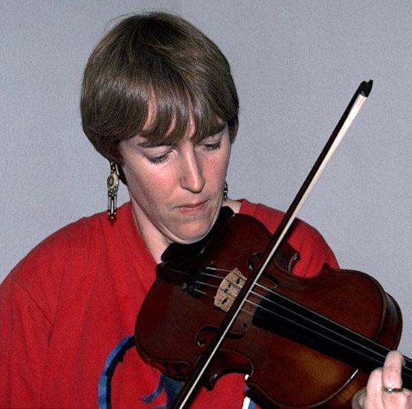 A woman playing a violin.