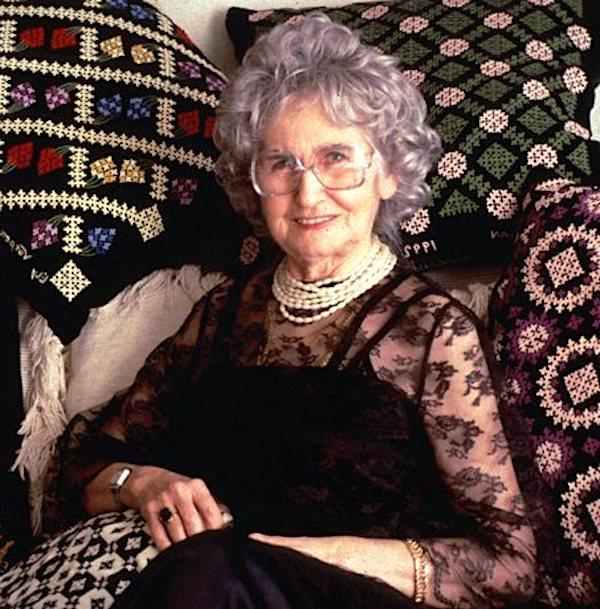 A woman sitting on a couch.