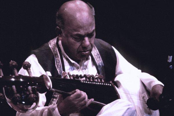 A man playing an instrument.