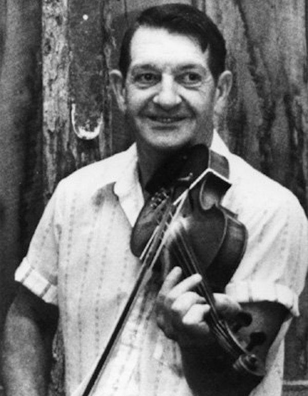 A man playing a fiddle.