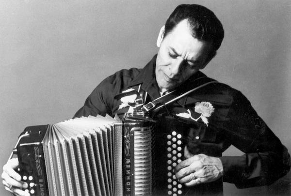 A man playing an accordion.