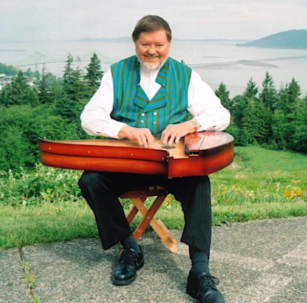 A man playing an instrument.