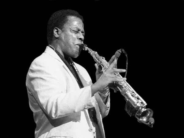 Man playing soprano sax.