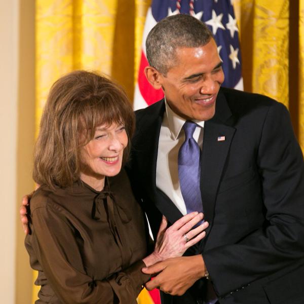 May receiving her medal form President Obama.