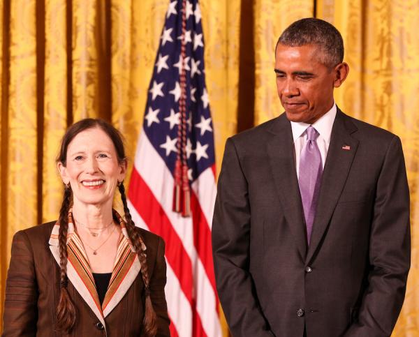 Meredith Monk receives her medal from President Obama.