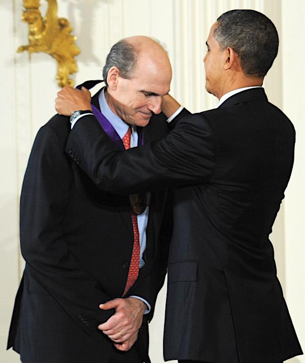 Singer and Songwriter James Taylor receives the 2010 National Medal of Arts from President Barack Obama