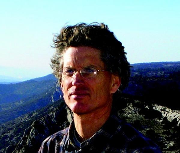 Man in mountainside. 