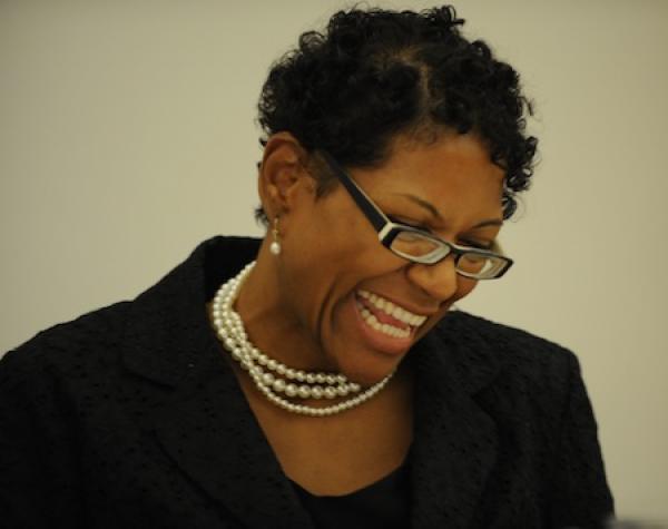 Portrait of woman smiling.